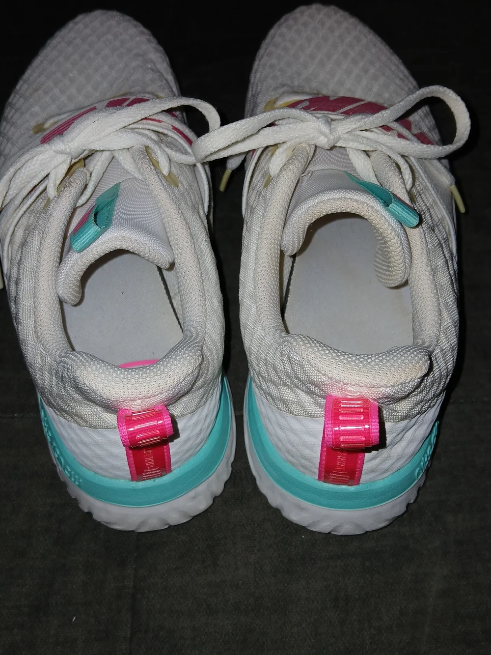 Nike Women’s White Athletic Sneakers with Pink Accents